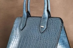 embossed leather handbag